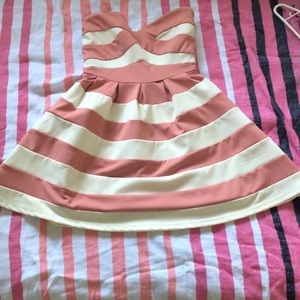 Baby pink/white striped strapless dress.